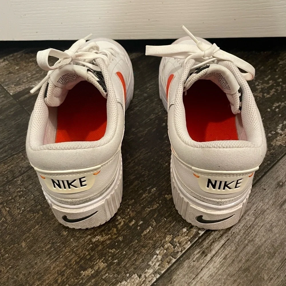 Women’s White and Orange Leopard Nikes sz 7.5 EUC